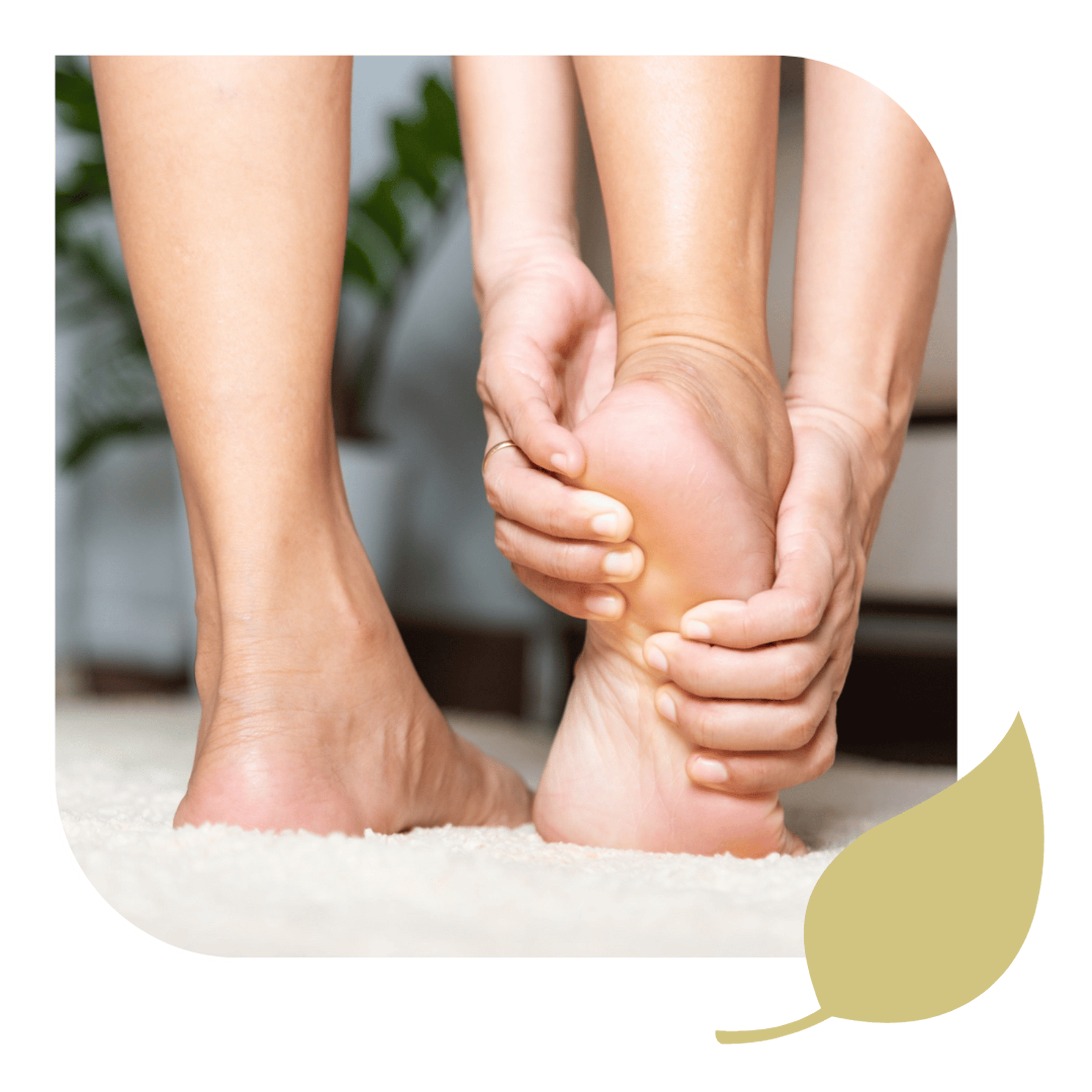 Woman holds her foot, seking relief from neuropathy in Stuart, FL.