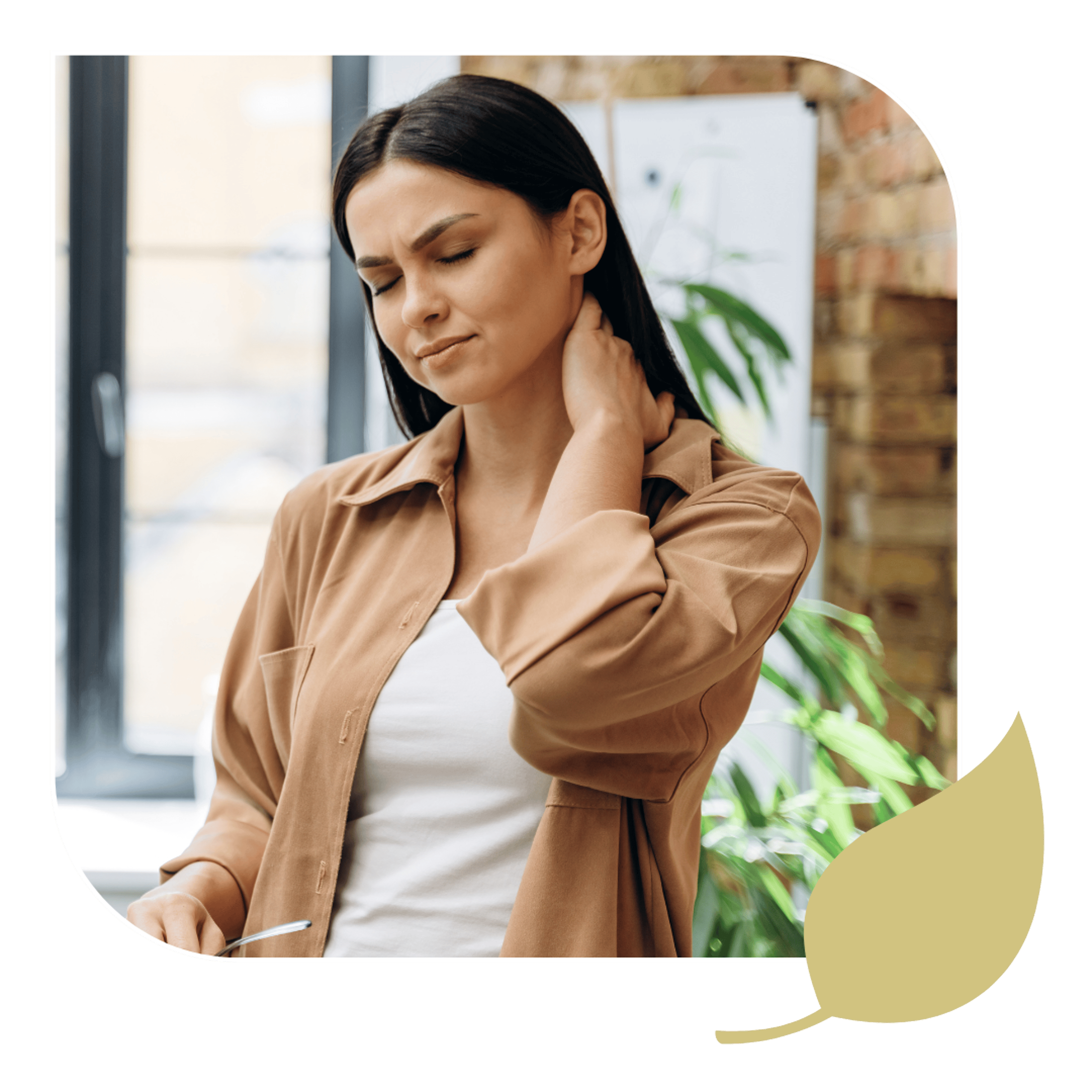 A woman holds her sore neck seeking neck pain relief in Stuart, FL.