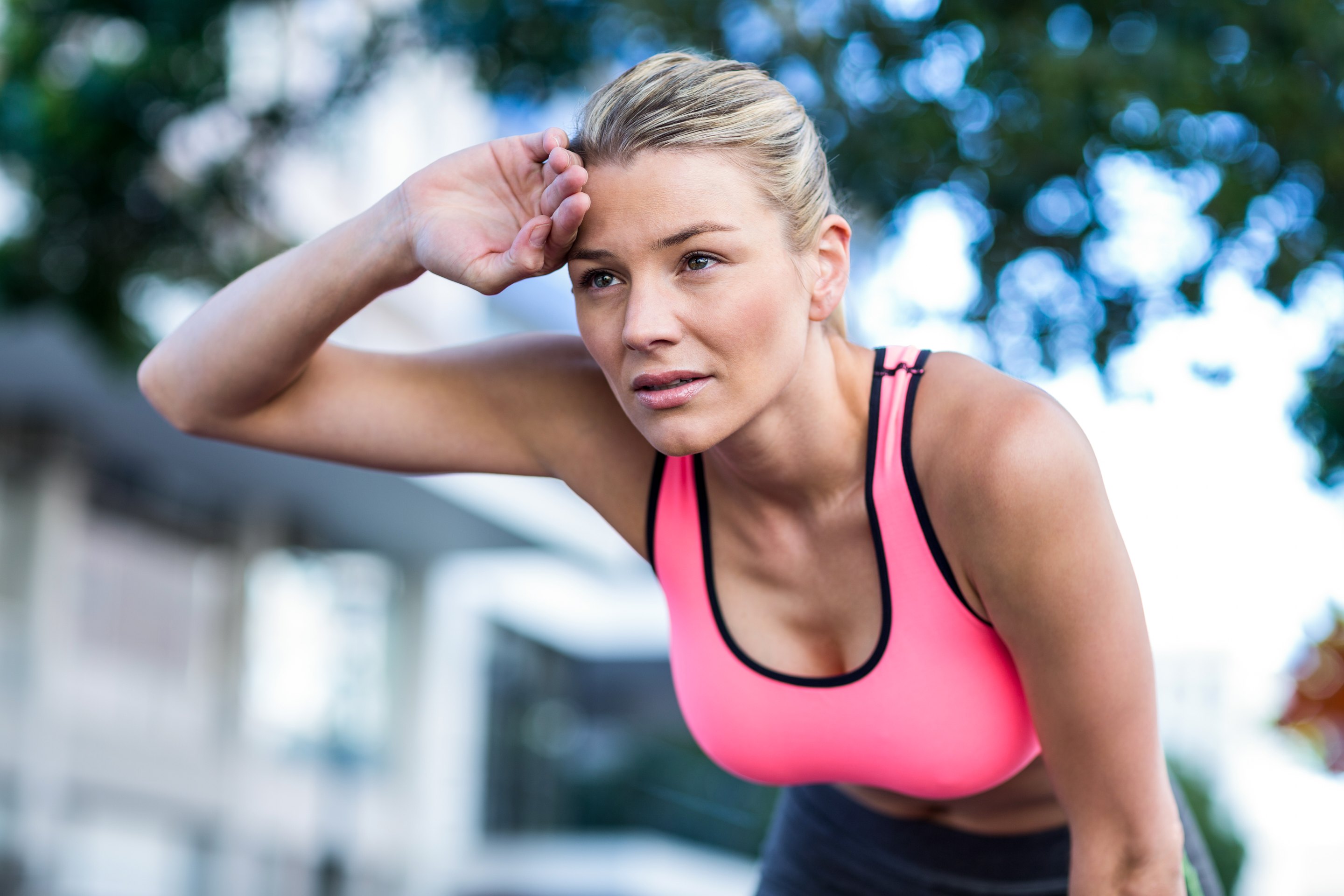 A female athlete jogging after Sport Injuries Treatment.