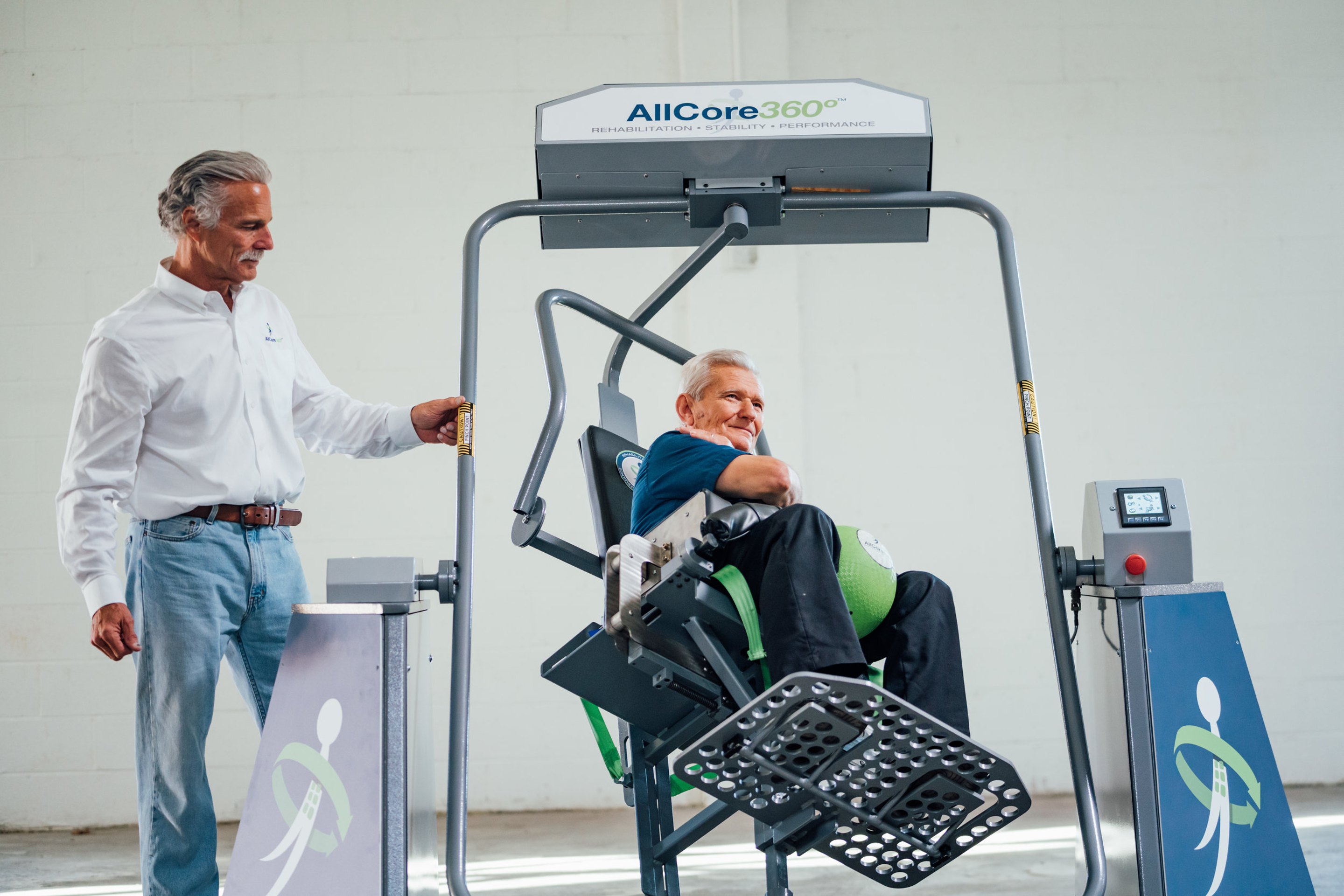A senior man using the AllCore360° machine for core rehabilitation.